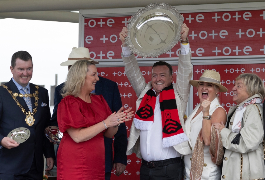 Tote general manager Lynda Reilly presents the Galway Plate to Philip Polly, owner of the Noel Meade-trained Pinkerton, winner of the 2024 renewal