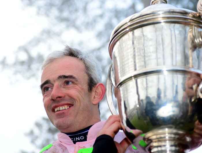 Ruby Walsh smiles for camera with trophy
