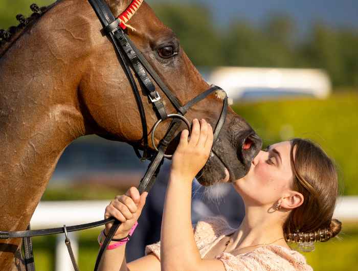 Chimeric with groom after winning race