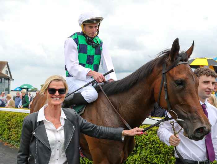 Winning connections walking into parade ring