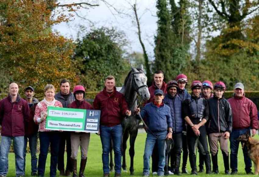 Staff from Michael Halford's yard pose for camera with bto prize