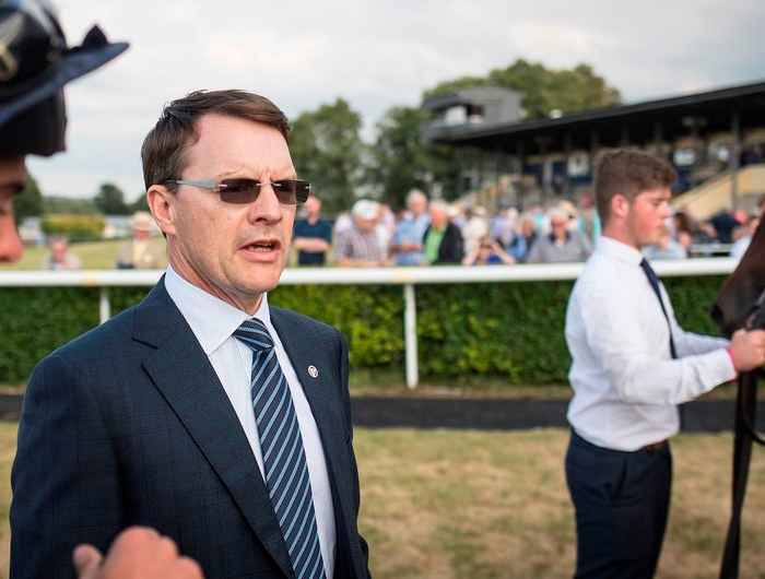 Aidan O'Brien in the parade ring at the track