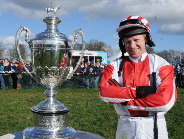 Colman Sweeney pictured standing beside trophy