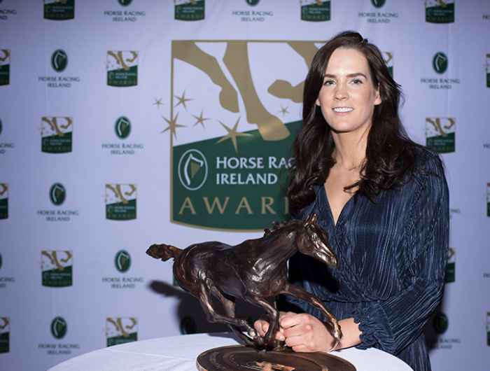 Rachael Blackmore smiles for camera with HRI award