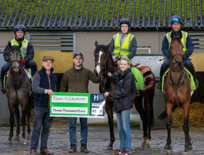 Staff from Michael O'Callaghan's yard receive prize for best turned out league