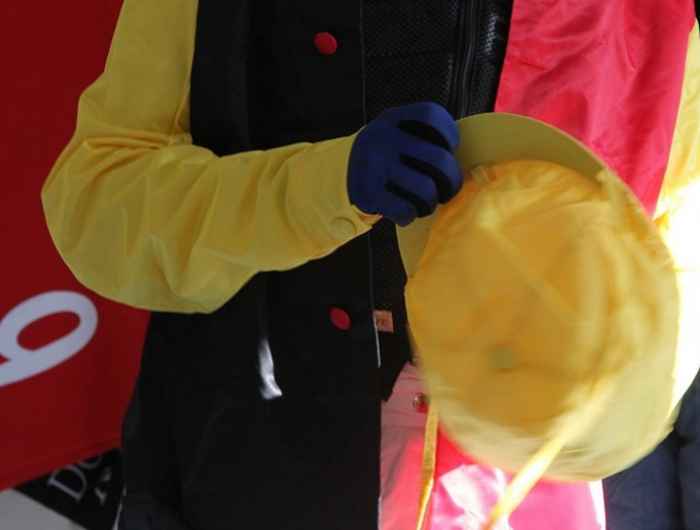 Jockeys silks with yellow racing helmet