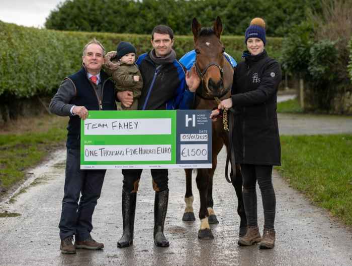 Joint winners James Fahy and Heather Heffernan smile as they receive bto prize