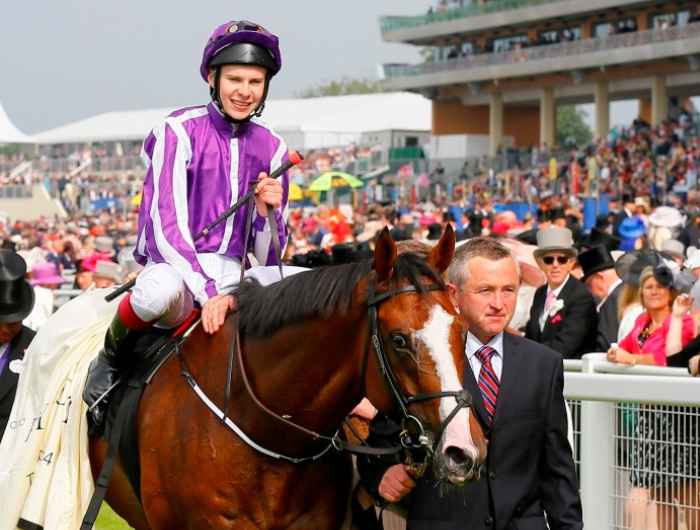 Joseph O'Brien being lead in on winning horse