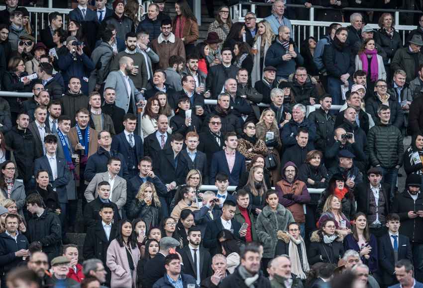 Crowd in the stands enjoying the racing at a Jumps Festival