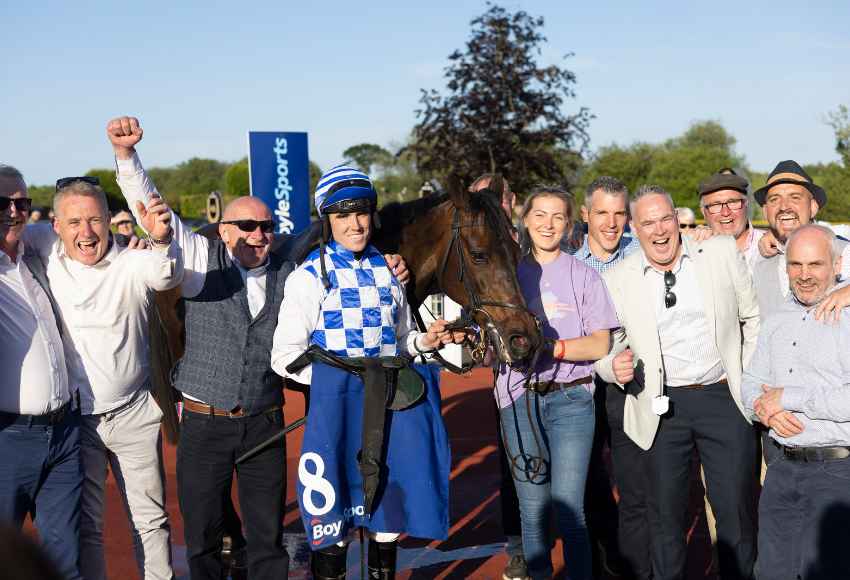 Winning connections in the parade ring at Down Royal racecourse 