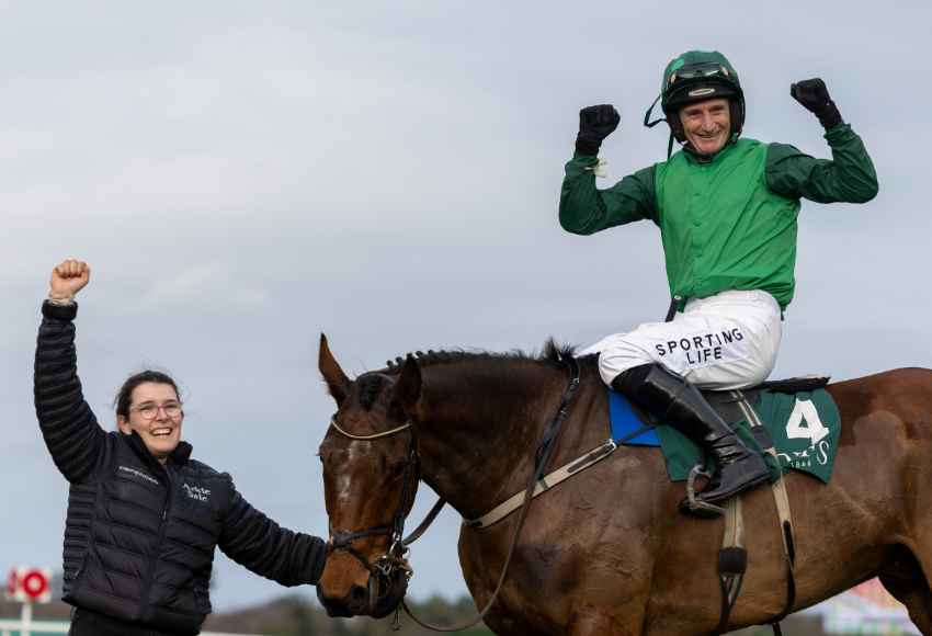 Jockey and groom celebrating win